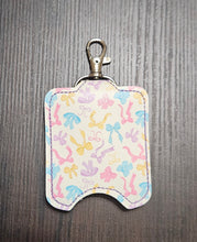 Load image into Gallery viewer, Pastel Bows Hand Sanitizer Holder
